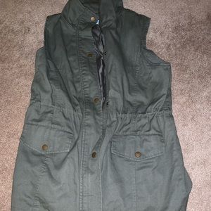 Francesca’s army green zip up and button up vest